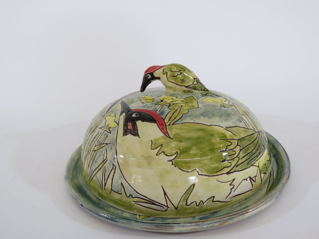 Butterdish depicting green woodpeckers